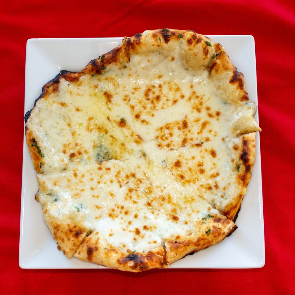 Cheese naan at Roopa's Kitchen.