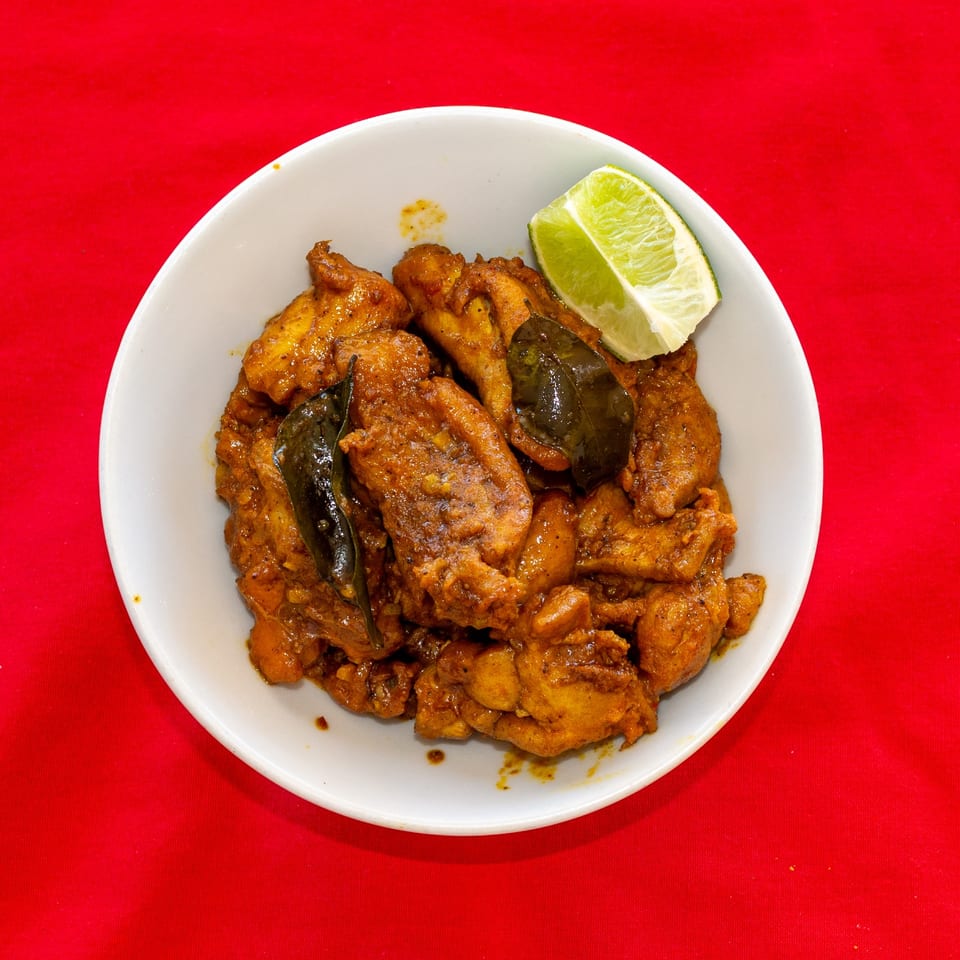 Chicken 65 with curry leaves and lime.